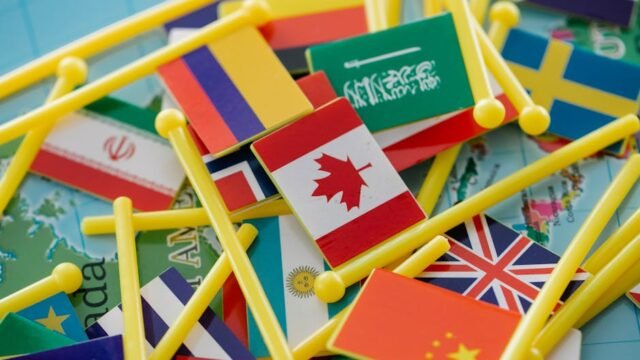 US-China flags diplomatic meeting world map