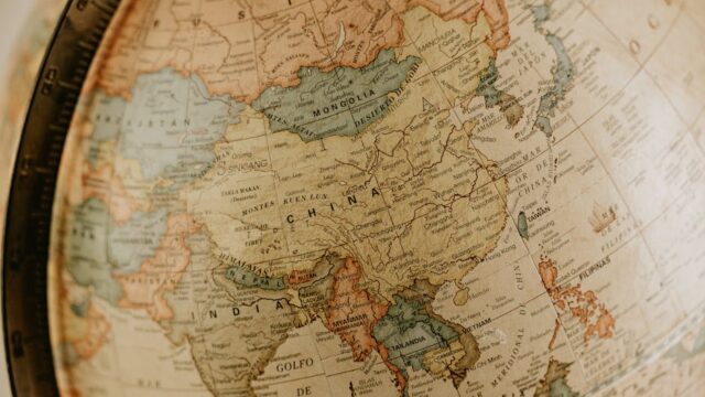 Putin Visit — Putin's China Visit: A Show of Unity with Hidden Cracks (featured)