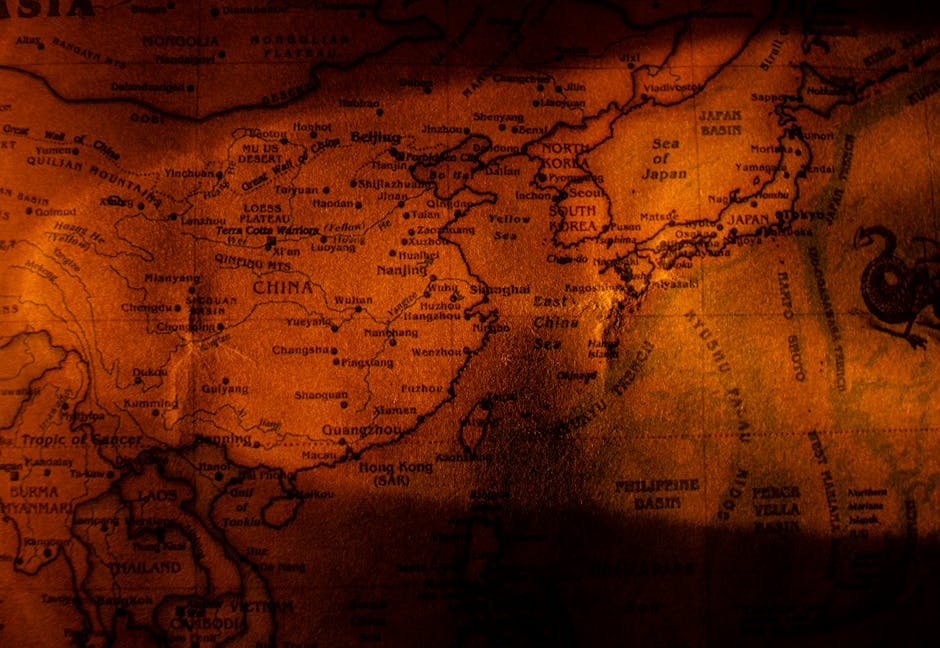 US-China flags diplomatic meeting world map