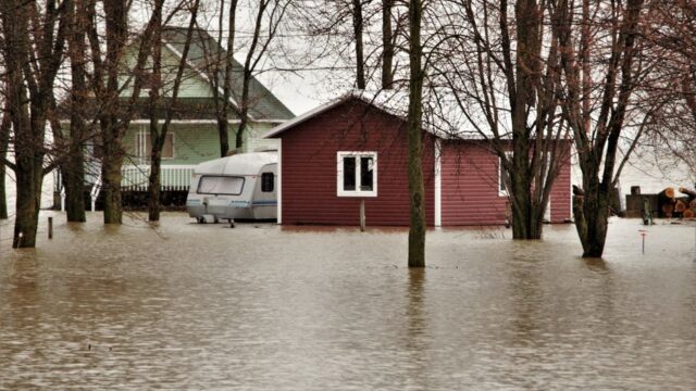 climate change — **Floodgates of Complacency: Michigan's Rural Areas Left Vulnerable to (featured)